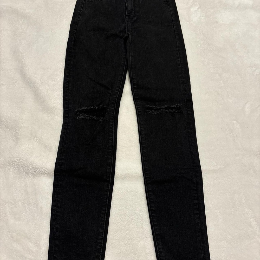 Black Skinny Jeans with Distressed Details
